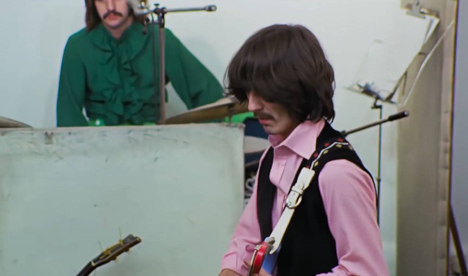The guitar straps worn by The Beatles in Get Back