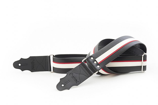 Model HOTROD BLACK this guitar strap recalls the colors and style of the old racing cars, baseball jerseys, guitars... Strap for acoustic guitars, electric guitars and basses. Synthetic material, does not slip or grip excessively. Includes metal rive