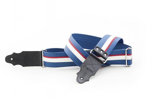 Model HOTROD BLUE this guitar strap recalls the colors and style of old racing cars, baseball jerseys, guitars... Strap for acoustic, electric and bass guitars. Synthetic material, does not slip or grip excessively. Includes metal rivets on the front