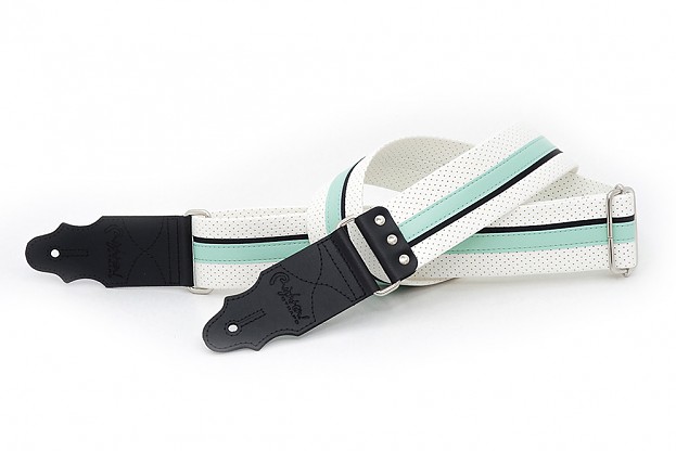 Model HOTROD TEAL this guitar strap recalls the colors and style of old racing cars, baseball jerseys, guitars... Strap for acoustic, electric and bass guitars. Synthetic material, does not slip or grip excessively. Includes metal rivets on the front