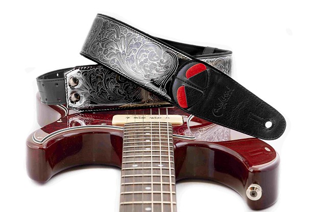 Revolver Titanium Guitar Strap | Elegant Floral-Engraved Design1